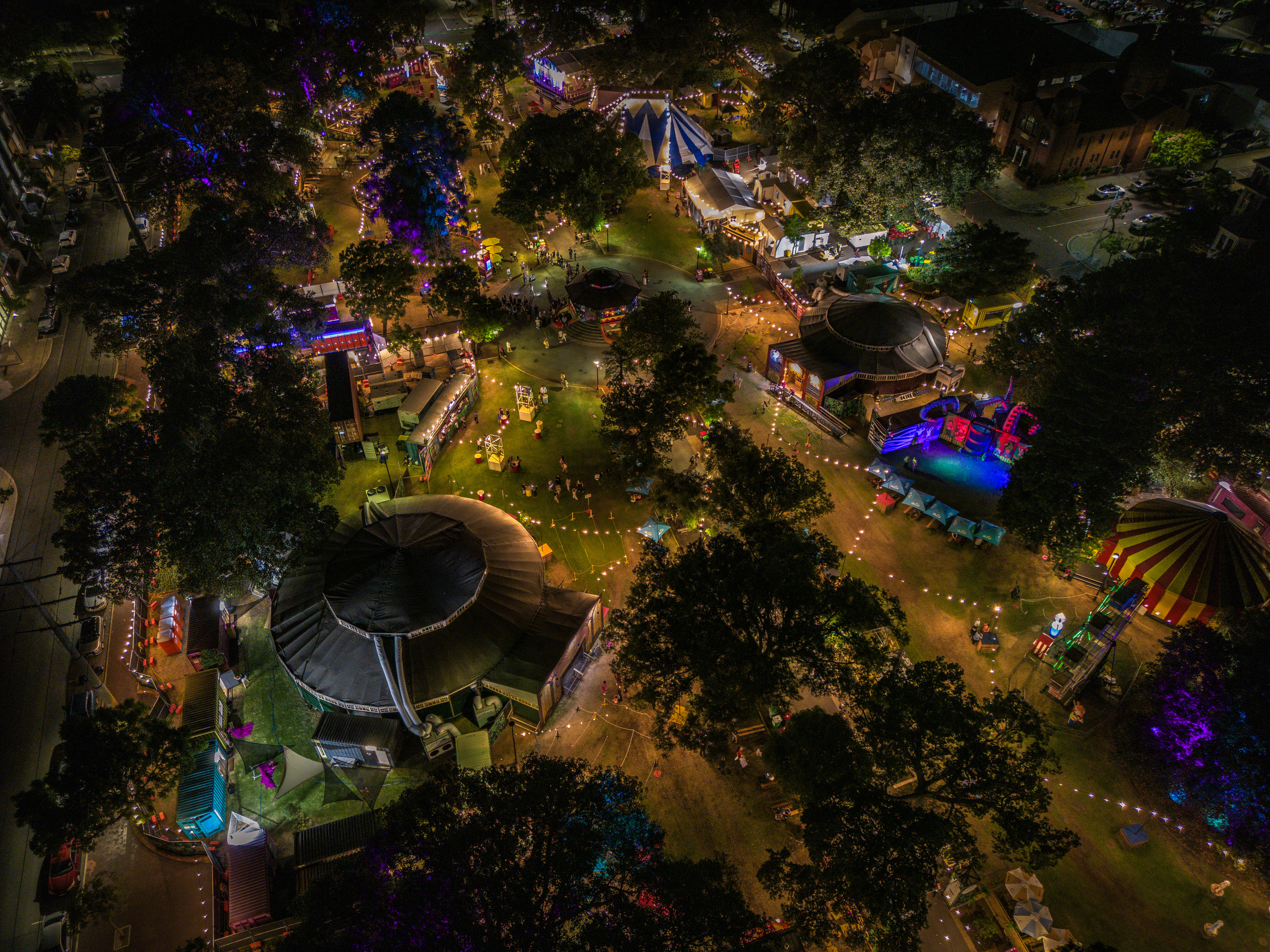 The same Fringe World site lit up at night
